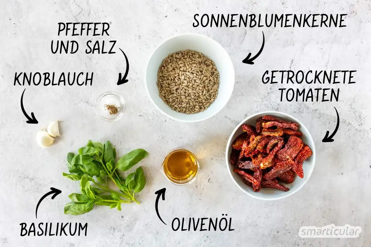 Zutaten für Pesto Rosso: Basilikum, Knoblauch, Sonnenblumenkerne, getrocknete Tomaten, Olivenöl, Pfeffer und Salz.